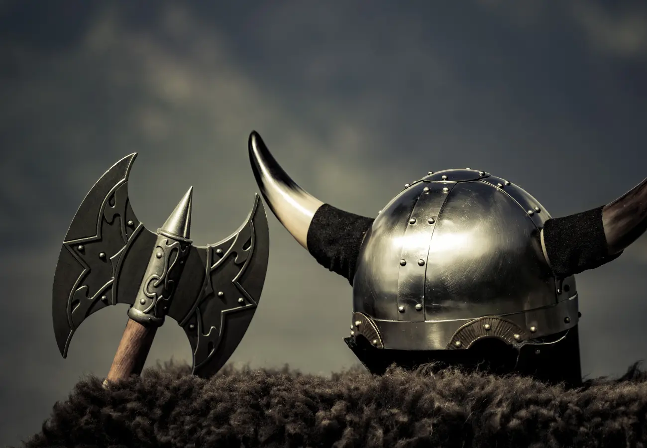 A comparison between the myth of horned Viking helmets and the simple, functional designs of authentic Viking helmets.