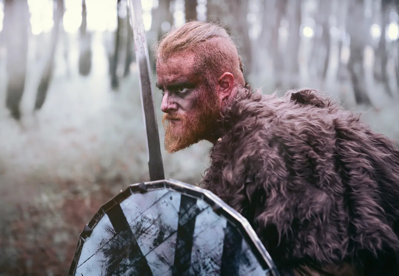 Viking warriors forming a shield wall, demonstrating strategic use of shields in battle.