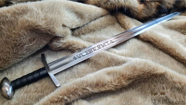 Ulfberht Viking sword, a legendary example of Viking weaponry, featuring crucible steel construction and ancient inscriptions, a symbol of historical Viking weapons.